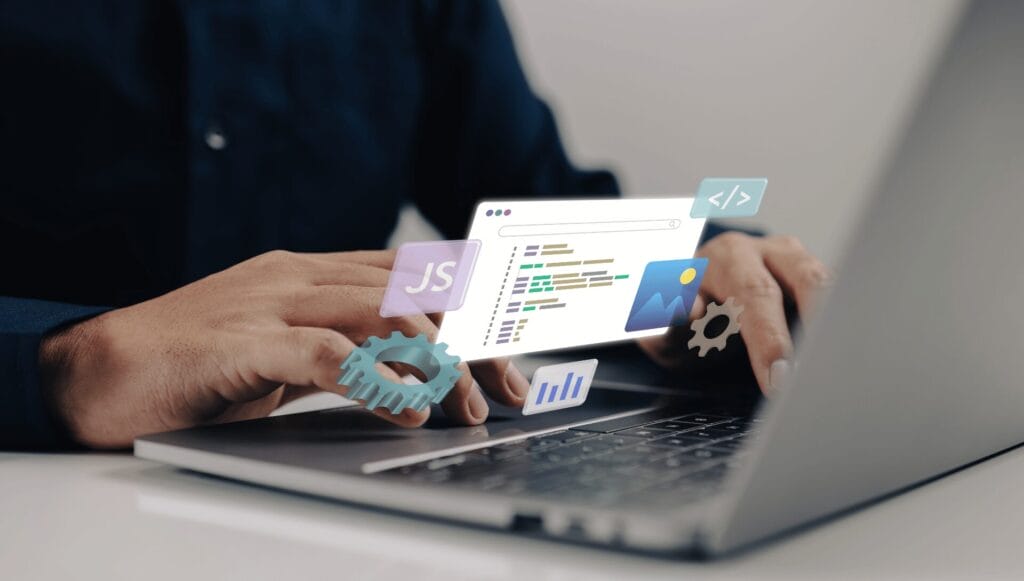 Hands typing on a laptop with floating overlay graphics showing code, a JavaScript icon, settings gears, and analytics symbols.